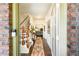 Welcoming foyer with hardwood floors, staircase, and view into the living room at 6150 Thorncrest Dr, Tucker, GA 30084