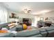 Spacious living room with modern furniture, fireplace, and ample natural light at 6150 Thorncrest Dr, Tucker, GA 30084