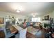 Open-concept living space with living room, dining area, and kitchen views at 6150 Thorncrest Dr, Tucker, GA 30084