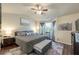 Spacious main bedroom with vaulted ceilings, large windows, and a cozy seating area at 6150 Thorncrest Dr, Tucker, GA 30084