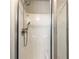 Modern shower with adjustable shower head and sleek glass door at 6150 Thorncrest Dr, Tucker, GA 30084