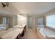 Bathroom featuring double vanity, soaking tub, and separate shower at 841 Sapphire Ln, Sugar Hill, GA 30518