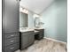 Well-lit bathroom includes dual sinks and lots of storage at 1214 Defoors Nw Ct # 1A, Atlanta, GA 30318