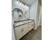 Modern bathroom features granite countertops and gold hardware at 1331 E Atlanta E Rd, Stockbridge, GA 30281