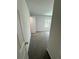 Bedroom with gray carpeting and a view out of the large window to the outdoors at 1331 E Atlanta E Rd, Stockbridge, GA 30281