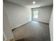 Carpeted bedroom with neutral paint and natural lighting at 1331 E Atlanta E Rd, Stockbridge, GA 30281
