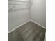 Walk-in closet with wire shelving and gray carpet at 1331 E Atlanta E Rd, Stockbridge, GA 30281