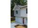 Beautiful two-story home with neutral toned siding, attached garage and modern accents at 1331 E Atlanta E Rd, Stockbridge, GA 30281