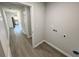 Hallway leading to kitchen and a view of the appliance at 1331 E Atlanta E Rd, Stockbridge, GA 30281