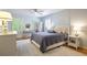 Bedroom with a large window and light blue walls, providing natural light at 2567 Hyde Manor Nw Dr, Atlanta, GA 30327