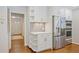 Kitchen featuring stainless steel appliances and white cabinets at 2567 Hyde Manor Nw Dr, Atlanta, GA 30327