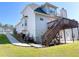 Spacious backyard with a large deck and stair, perfect for outdoor entertaining and relaxation at 385 Bethesda Park Trl, Lawrenceville, GA 30044