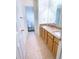 Bathroom with double sinks, granite countertops, and tiled flooring, connecting to a separate toilet area at 385 Bethesda Park Trl, Lawrenceville, GA 30044