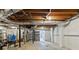 Unfinished basement featuring exposed ductwork, shelving, and painted walls ready for customization at 4462 Cain Cir, Tucker, GA 30084