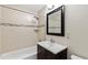 Modern bathroom featuring a vanity with storage, updated fixtures, and a shower-tub combination at 4462 Cain Cir, Tucker, GA 30084