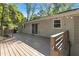 Wide wooden deck with railings features sliding glass doors and backyard views at 4462 Cain Cir, Tucker, GA 30084