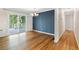 Bright dining area with hardwood floors and sliding glass door leading to an outdoor deck at 4462 Cain Cir, Tucker, GA 30084