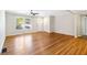 Bright living room with hardwood floors, large windows, and neutral paint, creating a welcoming atmosphere at 4462 Cain Cir, Tucker, GA 30084