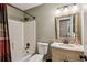Full bathroom with a shower-tub combination and neutral color scheme at 5876 Bridgemont Nw Pl, Acworth, GA 30101