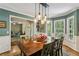 Comfortable dining room adjacent to the living area, featuring pendant lighting and natural light at 5876 Bridgemont Nw Pl, Acworth, GA 30101