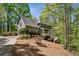 Charming two-story home with a well-manicured front yard and a welcoming front porch at 5876 Bridgemont Nw Pl, Acworth, GA 30101