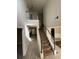 Inviting foyer showcases soaring ceilings, a staircase, and an open view to the living spaces at 1086 Deshon Trl, Lithonia, GA 30058