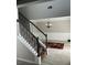 Staircase leads to an elegant dining room, enhancing the home's open and connected layout at 1086 Deshon Trl, Lithonia, GA 30058