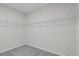 Walk in closet with built in shelving for storage at 529 Lanier Way, Temple, GA 30179
