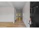 Inviting entryway with wood flooring and wainscoting at 529 Lanier Way, Temple, GA 30179