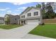 Attractive two-story home with a two-car garage and well-maintained lawn at 529 Lanier Way, Temple, GA 30179