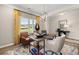 Bright home office featuring stylish desk, comfortable chairs, and modern decor with natural light at 529 Lanier Way, Temple, GA 30179