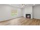 Spacious living room features a fireplace, ceiling fan, and natural light at 529 Lanier Way, Temple, GA 30179