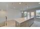 Bright and airy living room with door to the balcony at 529 Rubato Knl, Mcdonough, GA 30253