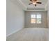 Spacious main bedroom with trey ceilings, large windows, and light wood-look flooring at 529 Rubato Knl, Mcdonough, GA 30253