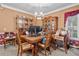 Traditional dining room featuring a vintage dining table and chairs, and a classic hutch at 614 Springharbor Dr, Woodstock, GA 30188