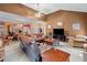 Spacious living room with a high vaulted ceiling, complemented by a cozy sofa and traditional furnishings at 614 Springharbor Dr, Woodstock, GA 30188