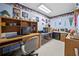 Office room featuring a built-in desk and shelves, offering ample workspace at 614 Springharbor Dr, Woodstock, GA 30188