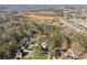 Lovely home nestled on wooded lot near new development offering a tranquil setting at 7115 Doncaster Ct, Cumming, GA 30040