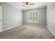 Well-lit bedroom with neutral colors and plantation shutters providing privacy at 10 Perimeter Summit Ne Blvd # 2207, Brookhaven, GA 30319