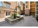 Outdoor courtyard with fountain, patio seating, and access to building at 10 Perimeter Summit Ne Blvd # 2207, Brookhaven, GA 30319