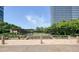 Outdoor park with trellises and a water feature with office buildings in the background at 10 Perimeter Summit Ne Blvd # 2207, Brookhaven, GA 30319