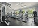 Bright and airy gym with treadmills, elliptical machines, and weightlifting equipment at 10 Perimeter Summit Ne Blvd # 2207, Brookhaven, GA 30319
