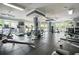A spacious gym features a variety of exercise equipment, ample windows, and bright lighting at 10 Perimeter Summit Ne Blvd # 2207, Brookhaven, GA 30319