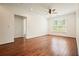 Inviting living area with hardwood floors, large windows, and abundant natural light at 10 Perimeter Summit Ne Blvd # 2207, Brookhaven, GA 30319