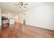 Living room showcasing the kitchen, open floor plan and hardwood floors at 10 Perimeter Summit Ne Blvd # 2207, Brookhaven, GA 30319