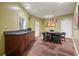 A kitchenette and card table with seating offers more options for the lounge area at 10 Perimeter Summit Ne Blvd # 2207, Brookhaven, GA 30319