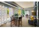 Relaxing lounge area with a glass table, comfortable seating, and bright natural light at 10 Perimeter Summit Ne Blvd # 2207, Brookhaven, GA 30319