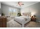Cozy bedroom with a plush bed, stylish decor, and a large window for natural light at 10 Perimeter Summit Ne Blvd # 2207, Brookhaven, GA 30319