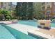 Community pool with plenty of lounge seating, landscaping, and 'no diving' warnings at 10 Perimeter Summit Ne Blvd # 2207, Brookhaven, GA 30319