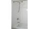 Clean white shower-tub combo features updated chrome shower head and faucet hardware at 10 Perimeter Summit Ne Blvd # 2207, Brookhaven, GA 30319